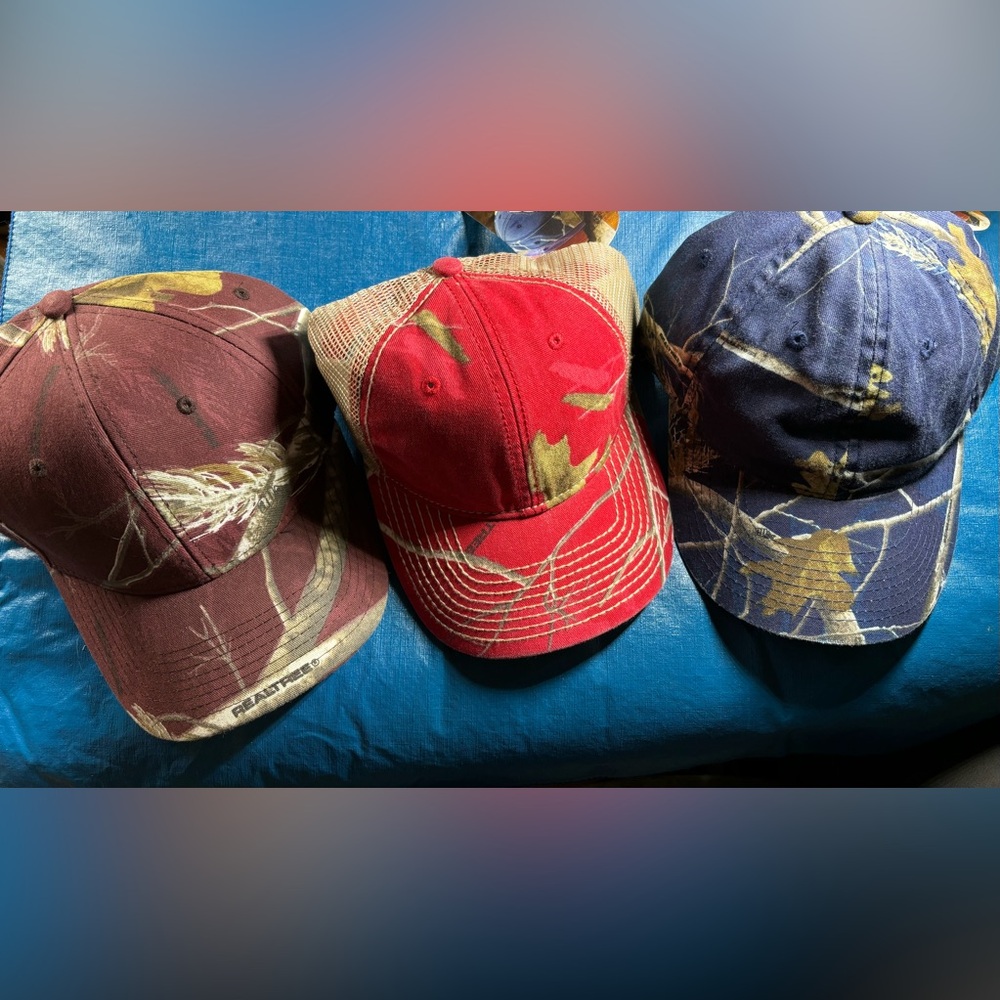 Bundle of three RealTree Camouflage Hats - maroon, red, and blue
